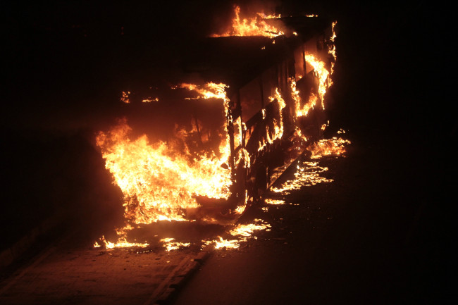 Kebakaran membakar setengah armada bus Burgos